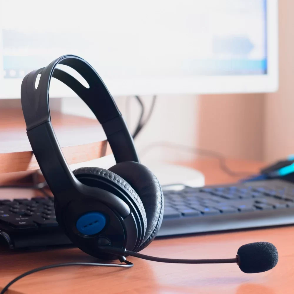 big-black-headphones-lie-wooden-desktop-sound